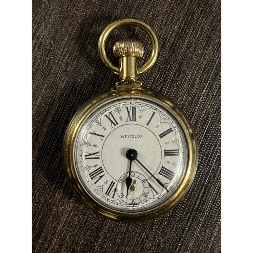Working Westclox Vintage gold pocket watch with train on back
